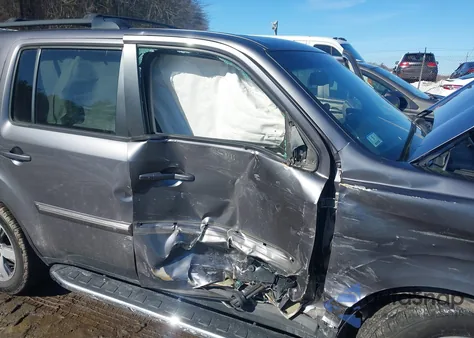 2014 Honda Pilot Touring z USA, uszkodzony, nr VIN 5FNYF4H94EB020353